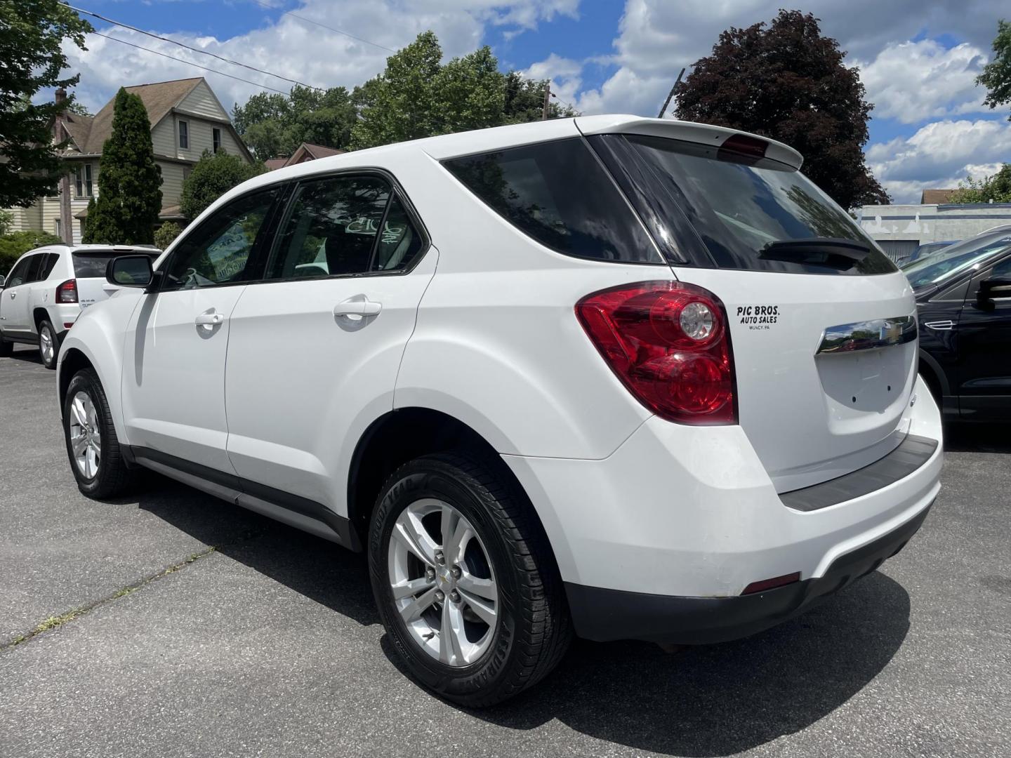 2015 White /black Chevrolet Equinox LS 2WD (2GNALAEK6F6) with an 2.4L L4 DOHC 16V FFV engine, 6-Speed Automatic transmission, located at 101 N. Main Street, Muncy, PA, 17756, (570) 546-5462, 41.207691, -76.785942 - Photo#2