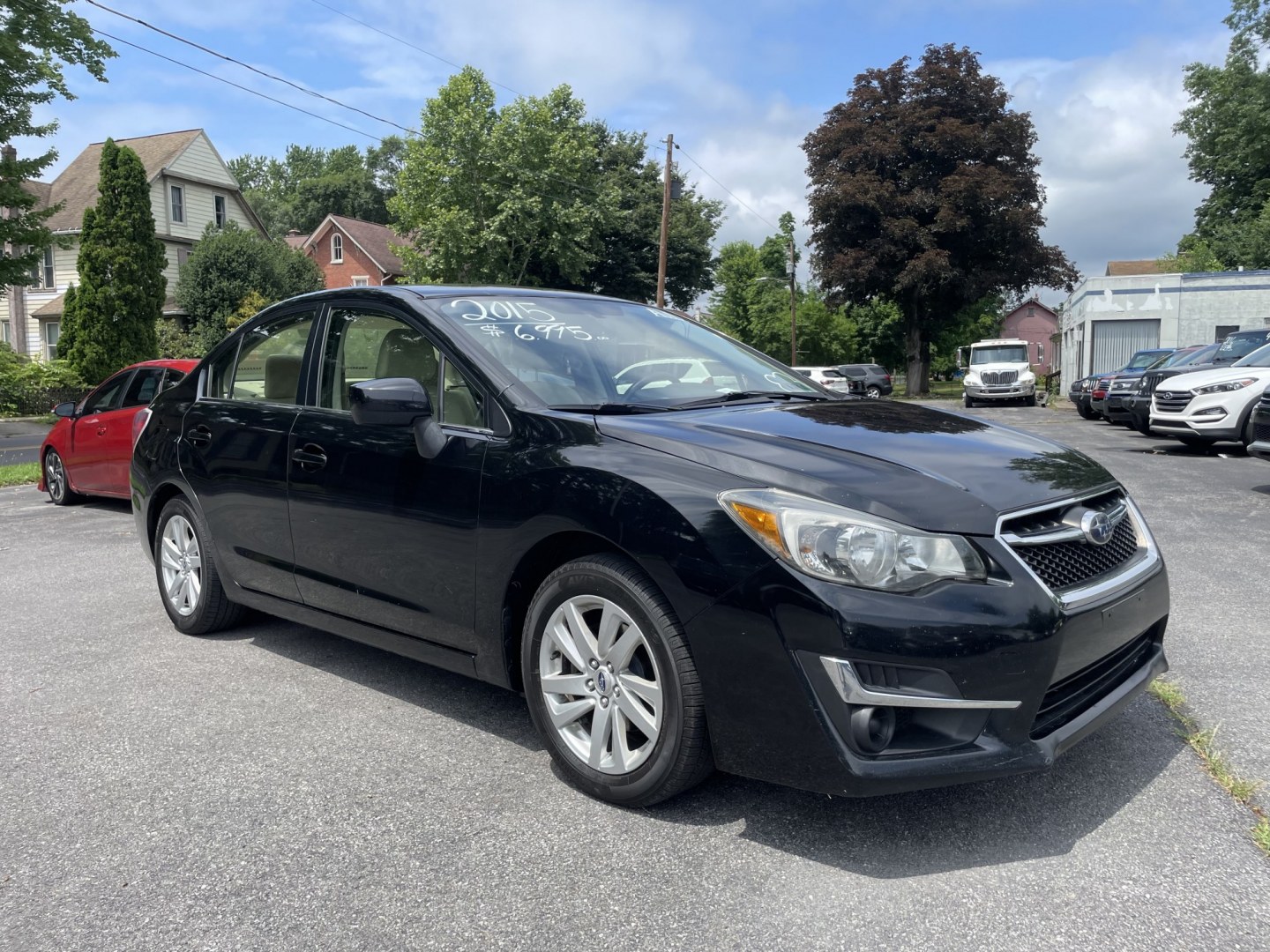 2015 Subaru Impreza 2.0i Premium PZEV 4-Door (JF1GJAC61FH) with an 2.0L H4 DOHC 16V engine, CVT transmission, located at 101 N. Main Street, Muncy, PA, 17756, (570) 546-5462, 41.207691, -76.785942- Photo#0