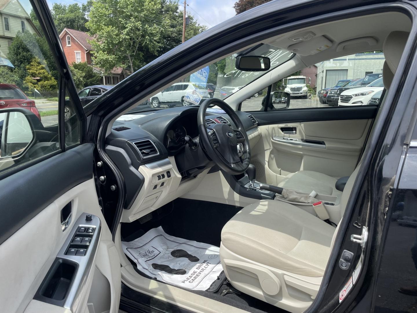 2015 Subaru Impreza 2.0i Premium PZEV 4-Door (JF1GJAC61FH) with an 2.0L H4 DOHC 16V engine, CVT transmission, located at 101 N. Main Street, Muncy, PA, 17756, (570) 546-5462, 41.207691, -76.785942- Photo#4