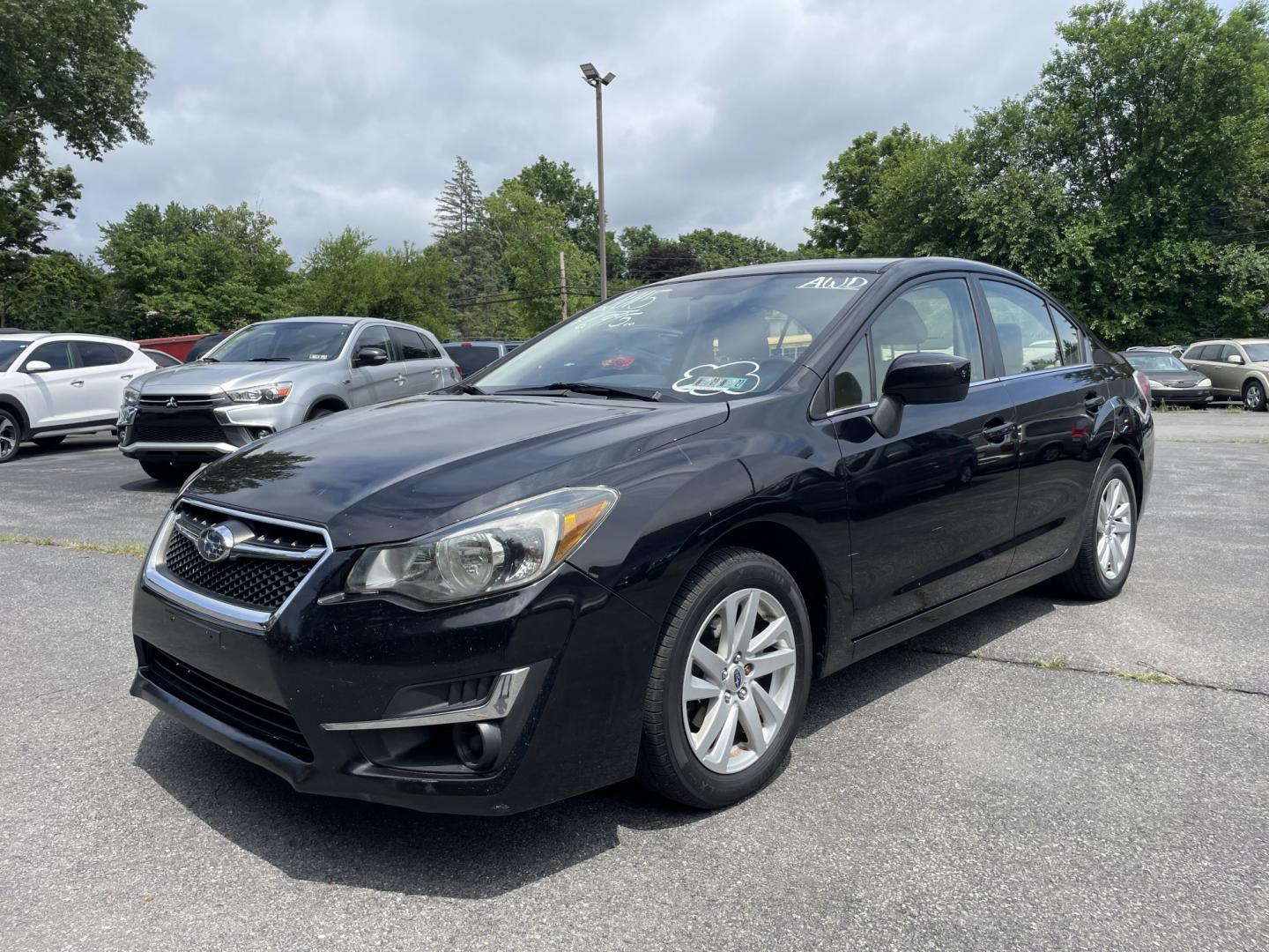 2015 Subaru Impreza 2.0i Premium PZEV 4-Door (JF1GJAC61FH) with an 2.0L H4 DOHC 16V engine, CVT transmission, located at 101 N. Main Street, Muncy, PA, 17756, (570) 546-5462, 41.207691, -76.785942- Photo#1