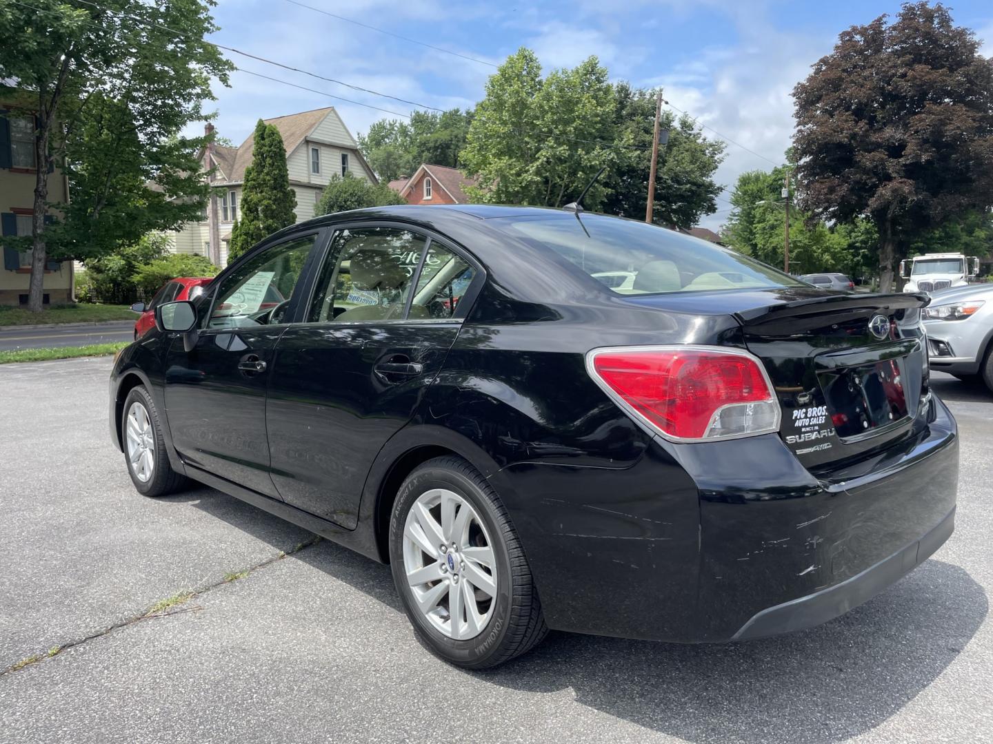 2015 Subaru Impreza 2.0i Premium PZEV 4-Door (JF1GJAC61FH) with an 2.0L H4 DOHC 16V engine, CVT transmission, located at 101 N. Main Street, Muncy, PA, 17756, (570) 546-5462, 41.207691, -76.785942- Photo#3