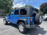 2010 Jeep Wrangler Unlimited Sport 4WD (1J4BA3H11AL) with an 3.8L V6 OHV 12V engine, located at 101 N. Main Street, Muncy, PA, 17756, (570) 546-5462, 41.207691, -76.785942- Photo#2
