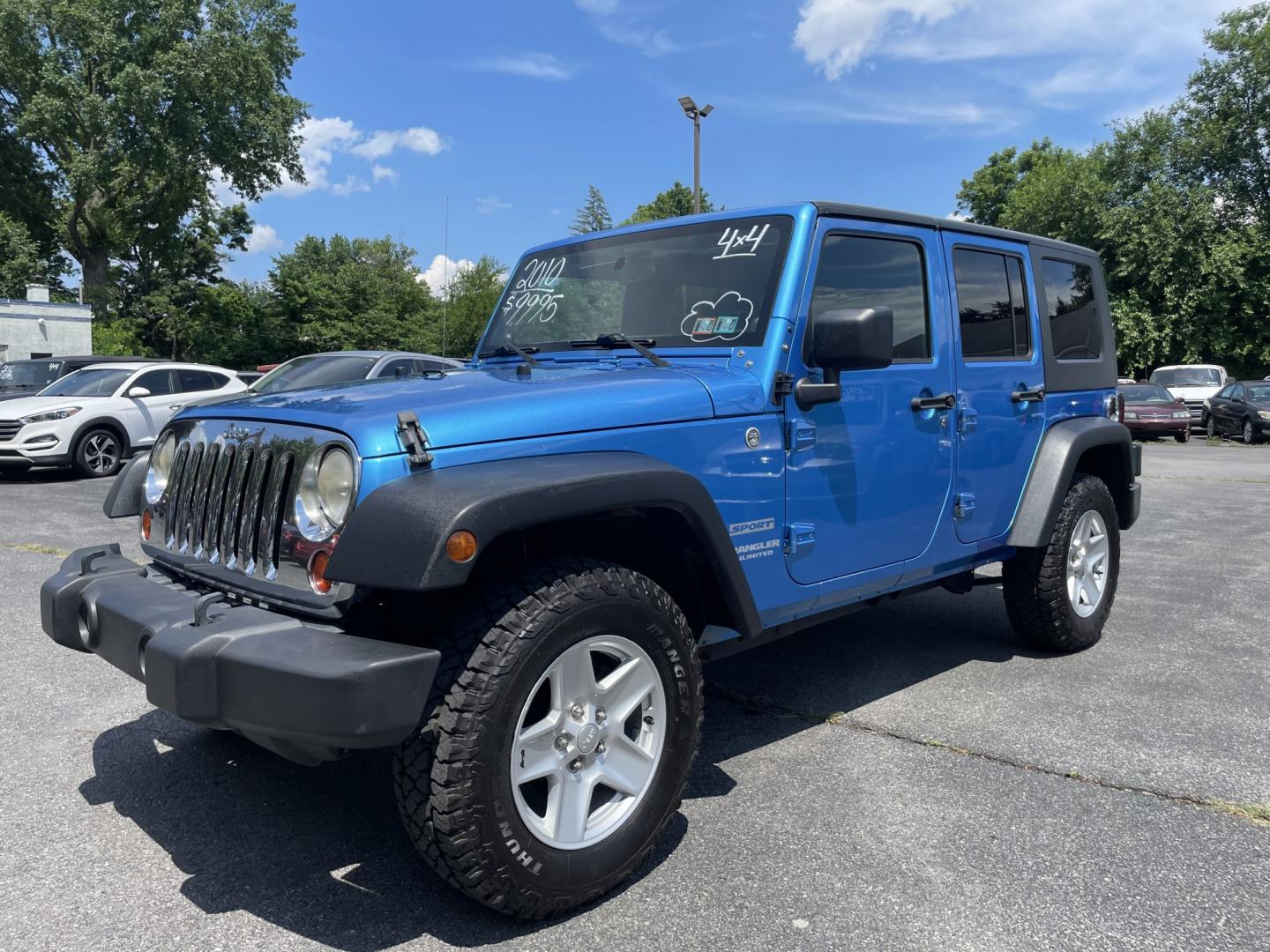 2010 Jeep Wrangler Unlimited Sport 4WD (1J4BA3H11AL) with an 3.8L V6 OHV 12V engine, located at 101 N. Main Street, Muncy, PA, 17756, (570) 546-5462, 41.207691, -76.785942- Photo#0