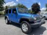 2010 Jeep Wrangler Unlimited Sport 4WD (1J4BA3H11AL) with an 3.8L V6 OHV 12V engine, located at 101 N. Main Street, Muncy, PA, 17756, (570) 546-5462, 41.207691, -76.785942- Photo#1