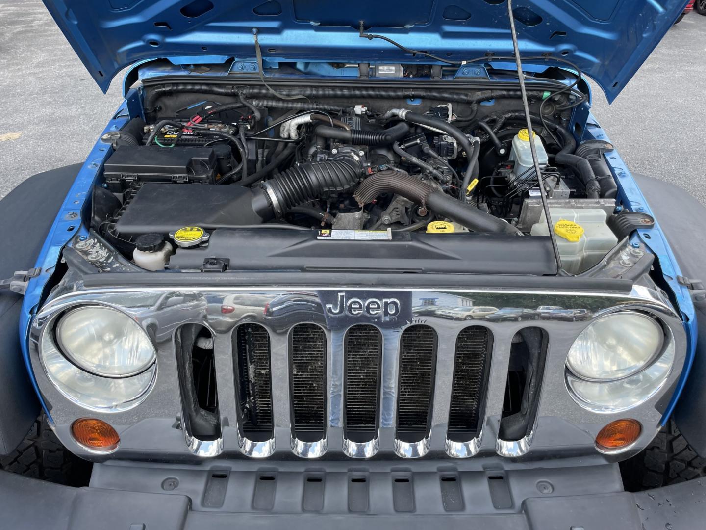 2010 Jeep Wrangler Unlimited Sport 4WD (1J4BA3H11AL) with an 3.8L V6 OHV 12V engine, located at 101 N. Main Street, Muncy, PA, 17756, (570) 546-5462, 41.207691, -76.785942- Photo#7