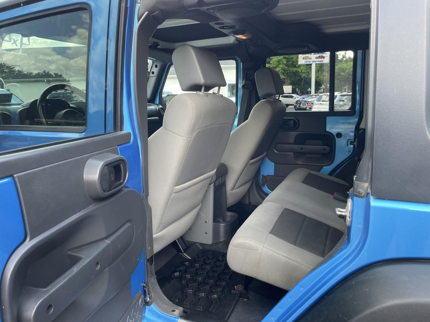 2010 Jeep Wrangler Unlimited Sport 4WD (1J4BA3H11AL) with an 3.8L V6 OHV 12V engine, located at 101 N. Main Street, Muncy, PA, 17756, (570) 546-5462, 41.207691, -76.785942- Photo#5