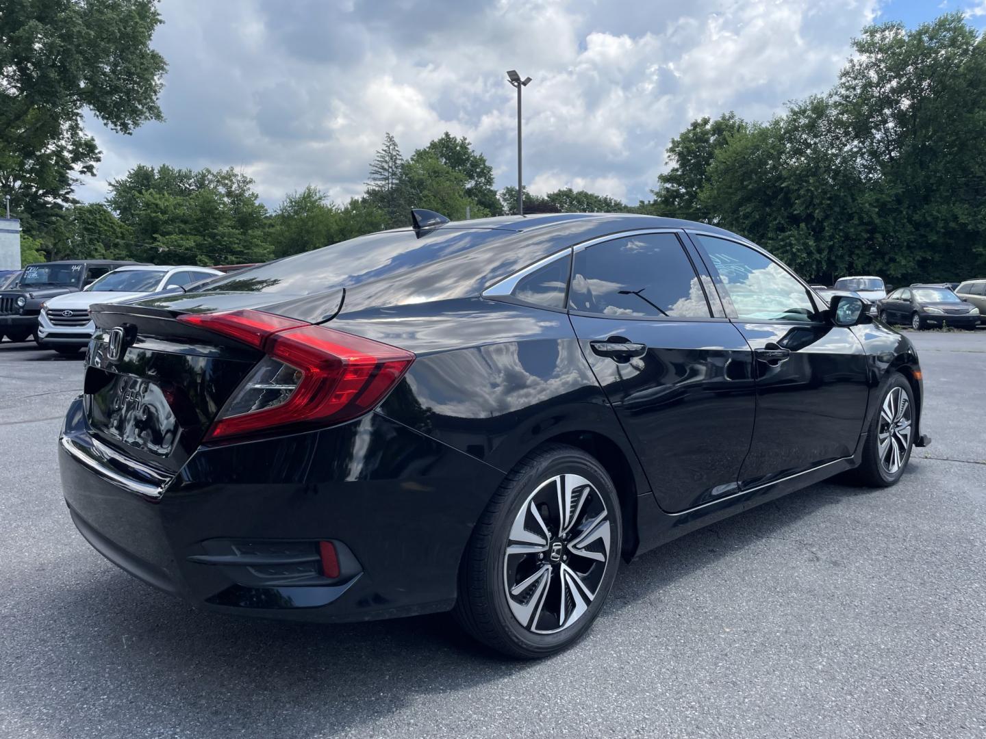 2016 Honda Civic EX-T Honda Sensing Sedan CVT (2HGFC1F42GH) with an 1.5L L4 DOHC 16V TURBO engine, CVT transmission, located at 101 N. Main Street, Muncy, PA, 17756, (570) 546-5462, 41.207691, -76.785942- Photo#3