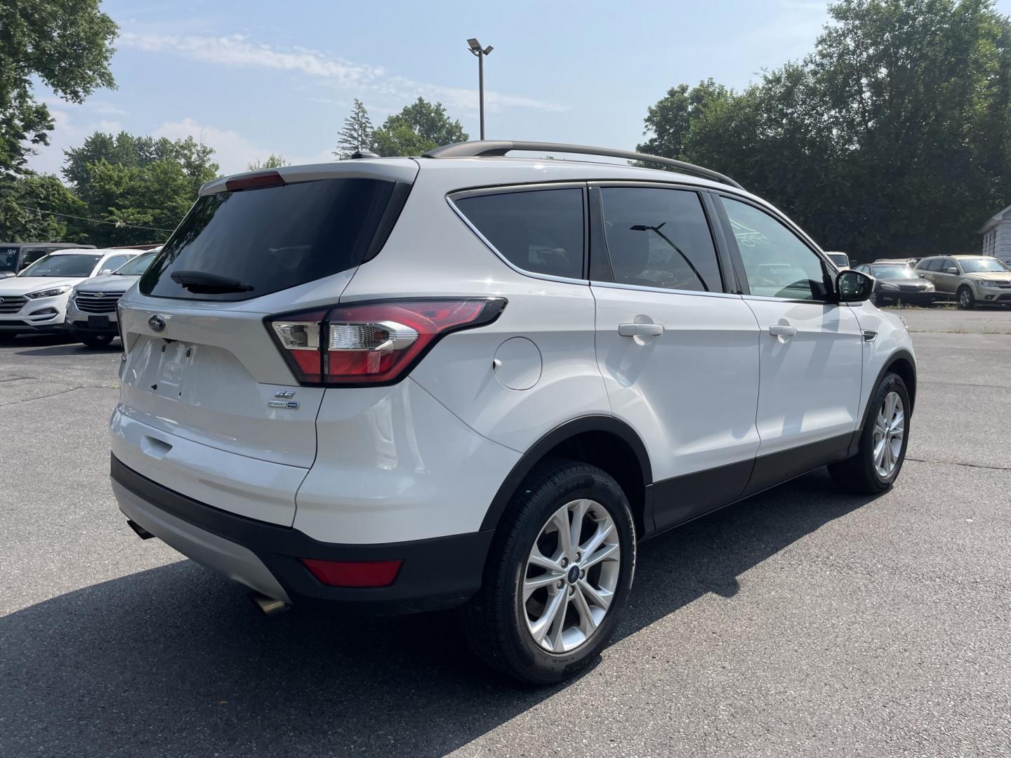 2018 White Ford Escape SE 4WD (1FMCU9GD4JU) with an 1.5L L4 DOHC 16V engine, 6A transmission, located at 101 N. Main Street, Muncy, PA, 17756, (570) 546-5462, 41.207691, -76.785942- Photo#3