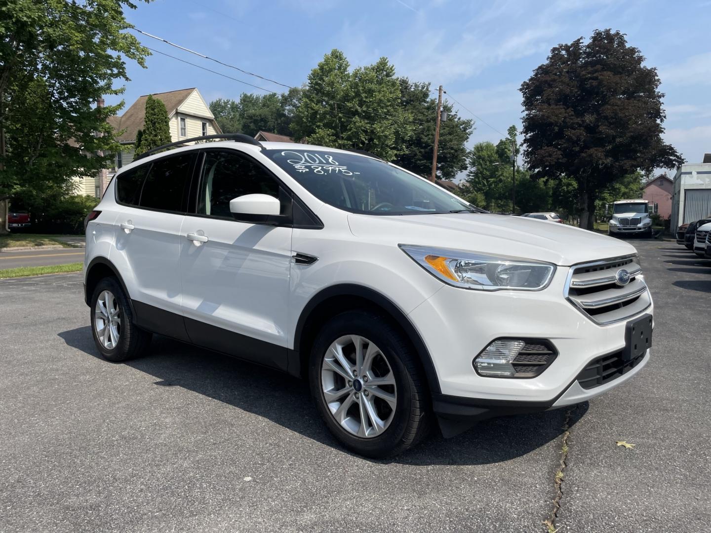 2018 White Ford Escape SE 4WD (1FMCU9GD4JU) with an 1.5L L4 DOHC 16V engine, 6A transmission, located at 101 N. Main Street, Muncy, PA, 17756, (570) 546-5462, 41.207691, -76.785942- Photo#1