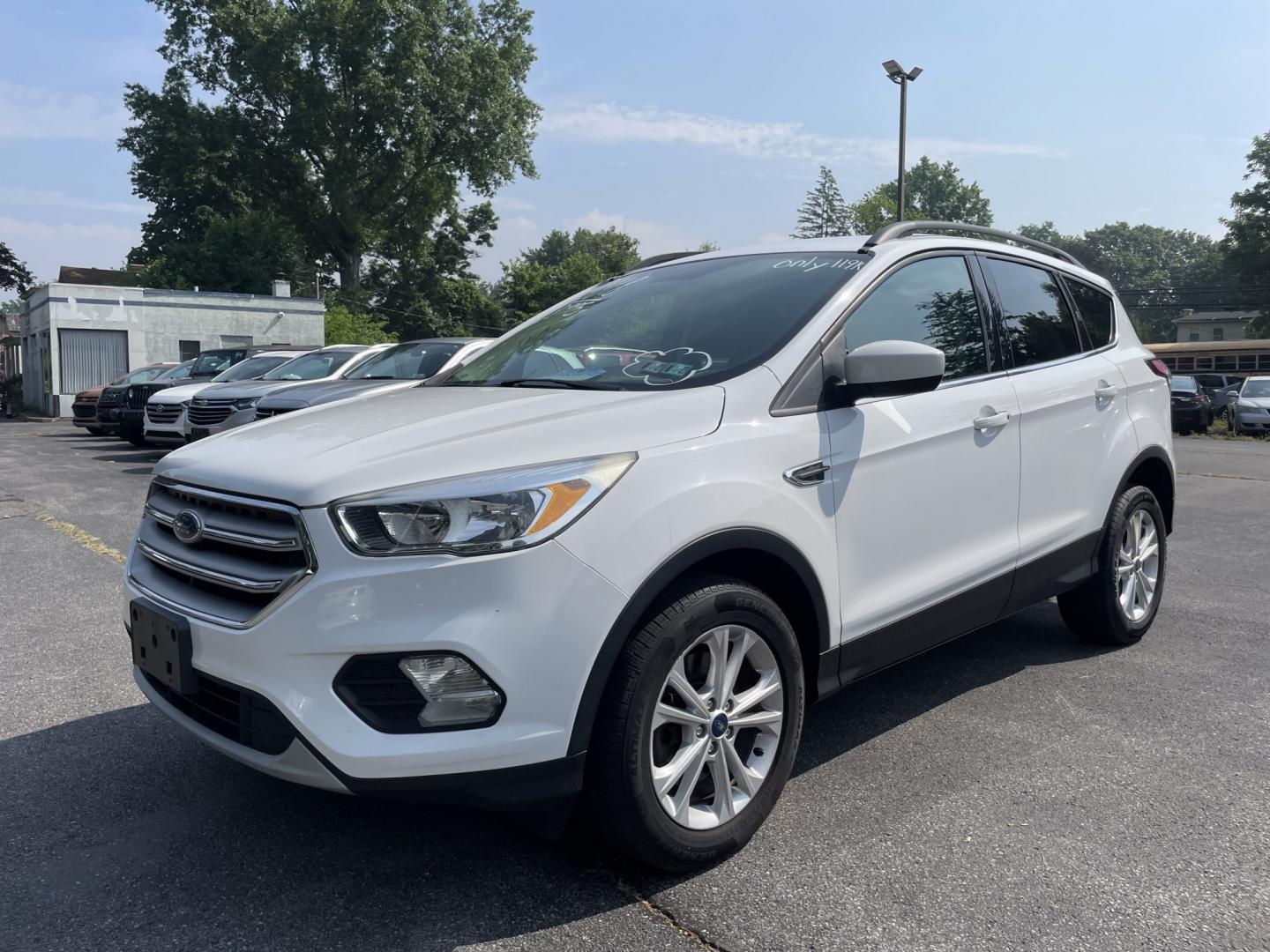 2018 White Ford Escape SE 4WD (1FMCU9GD4JU) with an 1.5L L4 DOHC 16V engine, 6A transmission, located at 101 N. Main Street, Muncy, PA, 17756, (570) 546-5462, 41.207691, -76.785942- Photo#0