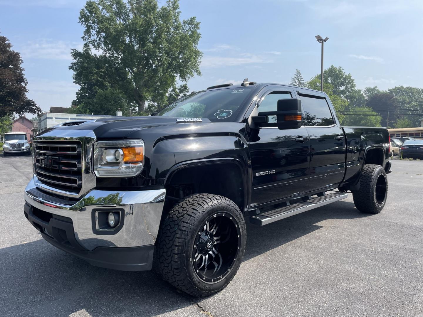 2018 GMC Sierra 2500HD SLE Crew Cab 4WD (1GT12SEY5JF) with an 6.6L V8 OHV 16 DIESEL engine, 6A transmission, located at 101 N. Main Street, Muncy, PA, 17756, (570) 546-5462, 41.207691, -76.785942- Photo#0
