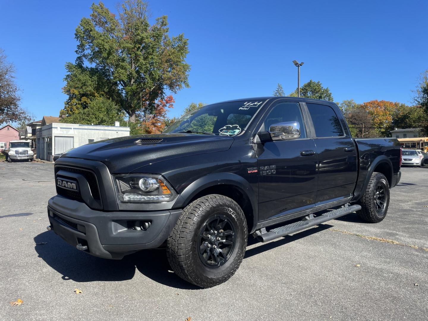 2017 black Ram 1500 Rebel Crew Cab SWB 4WD (1C6RR7YT0HS) with an 5.7L V8 OHV 16V engine, 8A transmission, located at 101 N. Main Street, Muncy, PA, 17756, (570) 546-5462, 41.207691, -76.785942- Photo#0